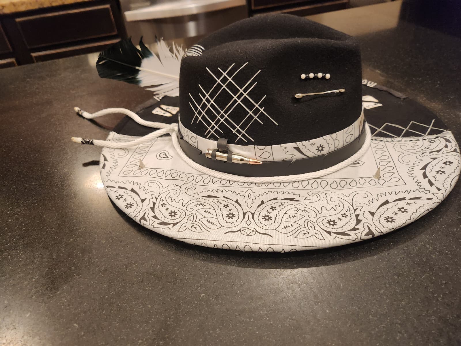 A black and white handmade Casa Pedrín hat